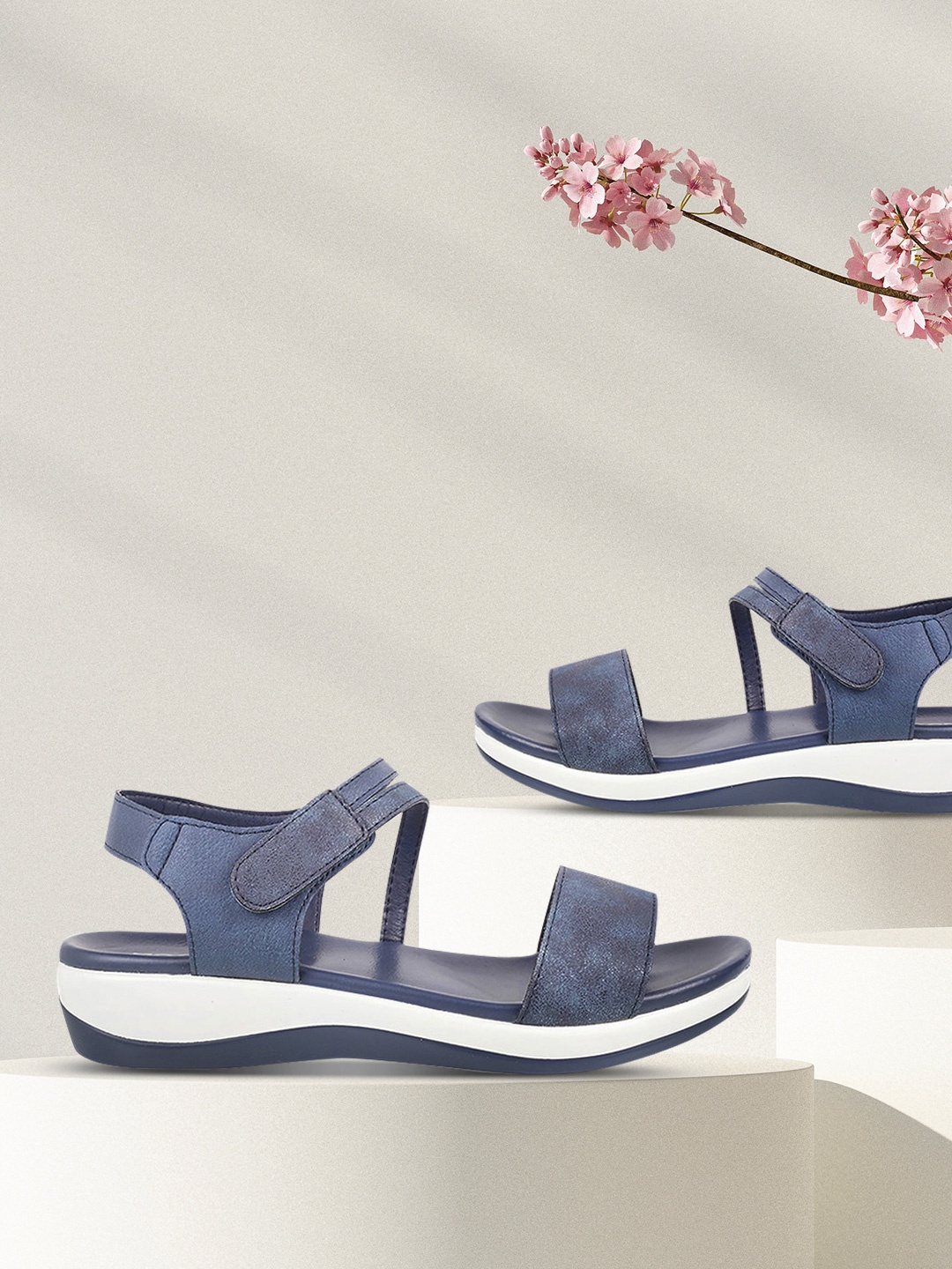 

Mochi Women Navy Blue Solid Comfort Heels