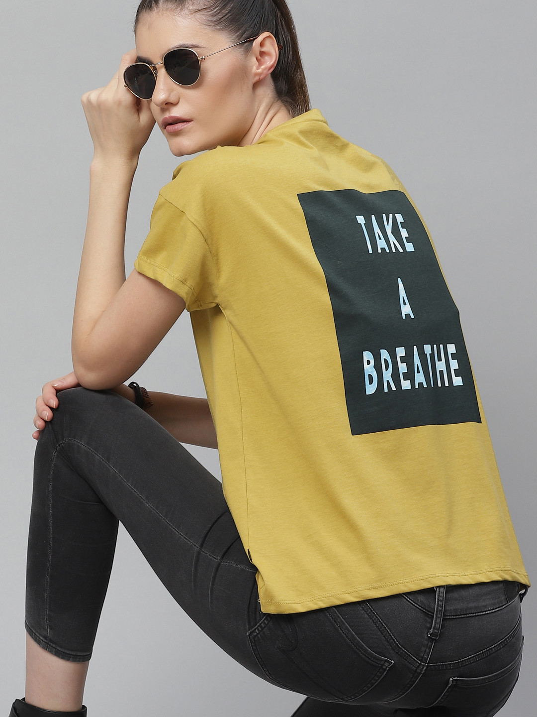 

The Roadster Lifestyle Co Women Mustard Yellow Black Printed Round Neck Pure Cotton T-shirt