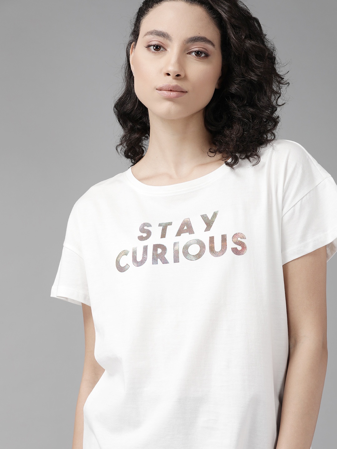 

The Roadster Lifestyle Co Women White Printed Pure Cotton Loose Fit Round Neck Pure Cotton T-shirt