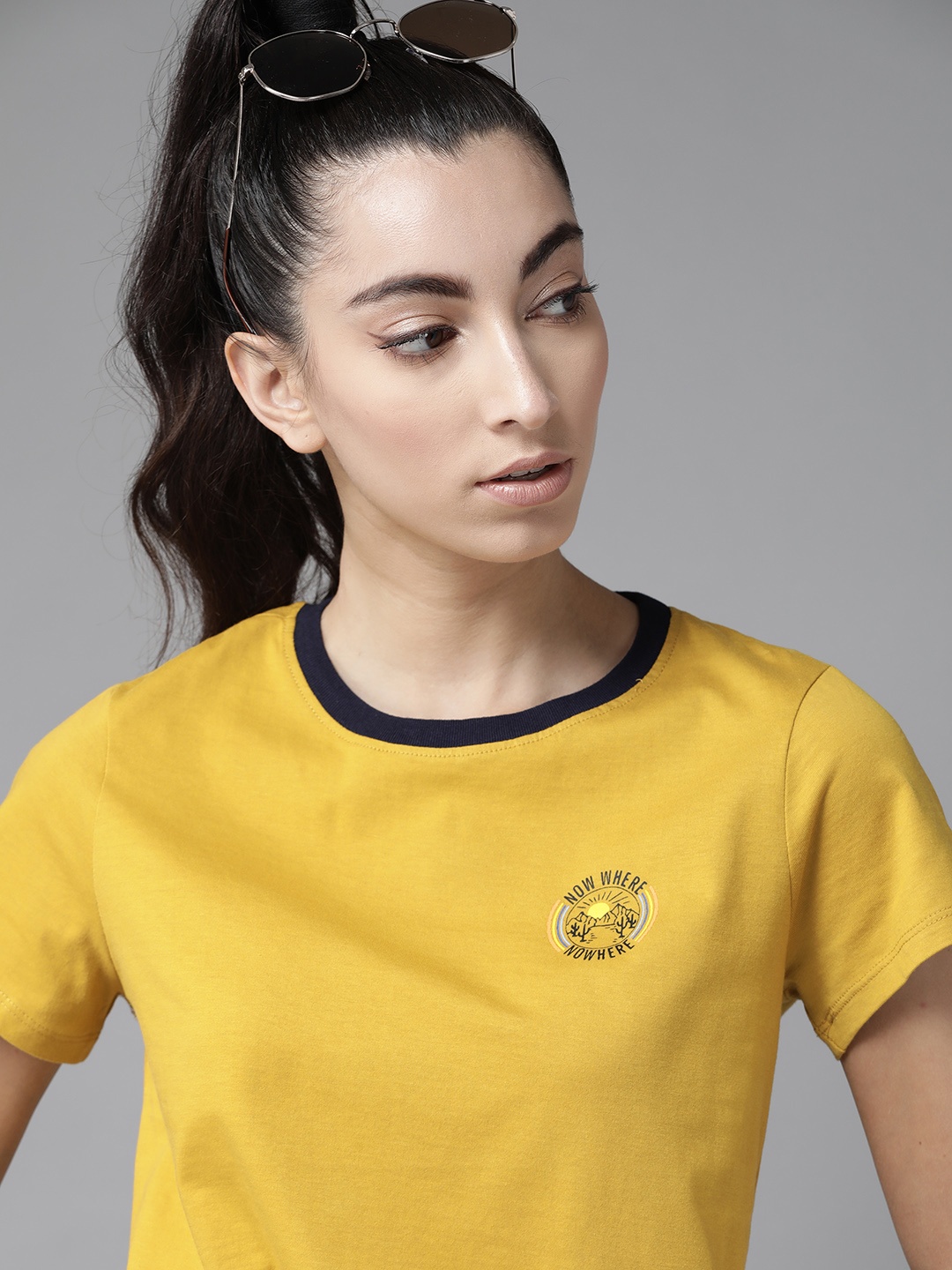 

The Roadster Lifestyle Co Women Mustard Pure Cotton Solid Round Neck Pure Cotton T-shirt