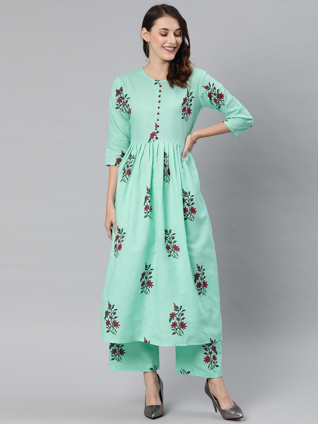 

GoSriKi Women Sea Green & Red Floral Printed Kurta with Palazzos