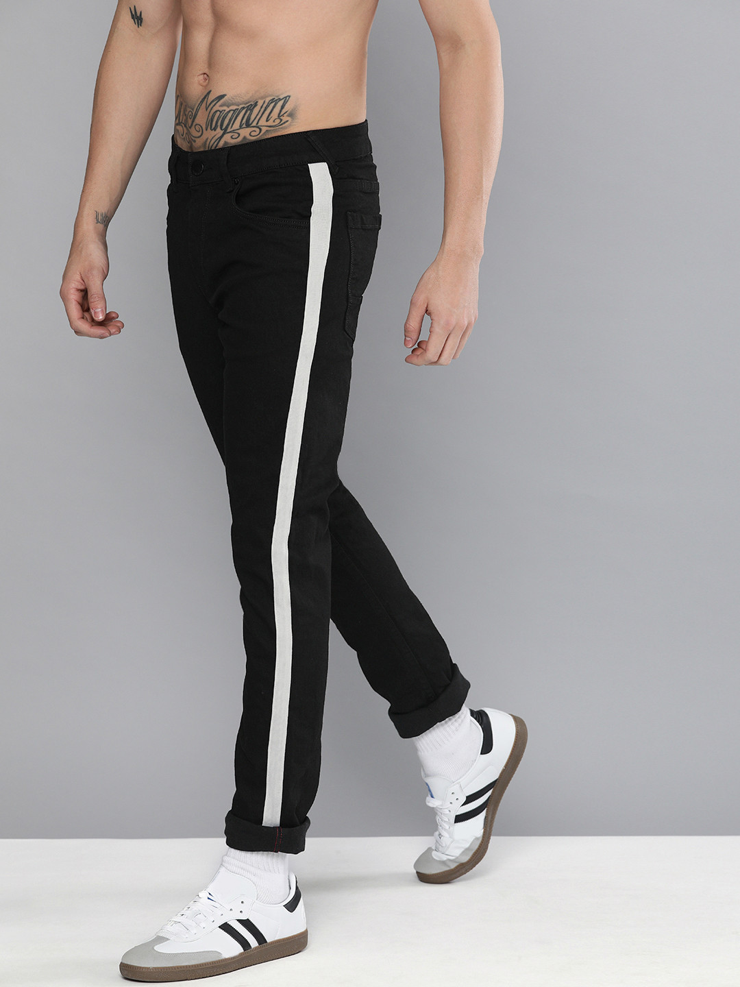 

HERE&NOW Men Black Regular Fit Mid-Rise Clean Look Stretchable Jeans