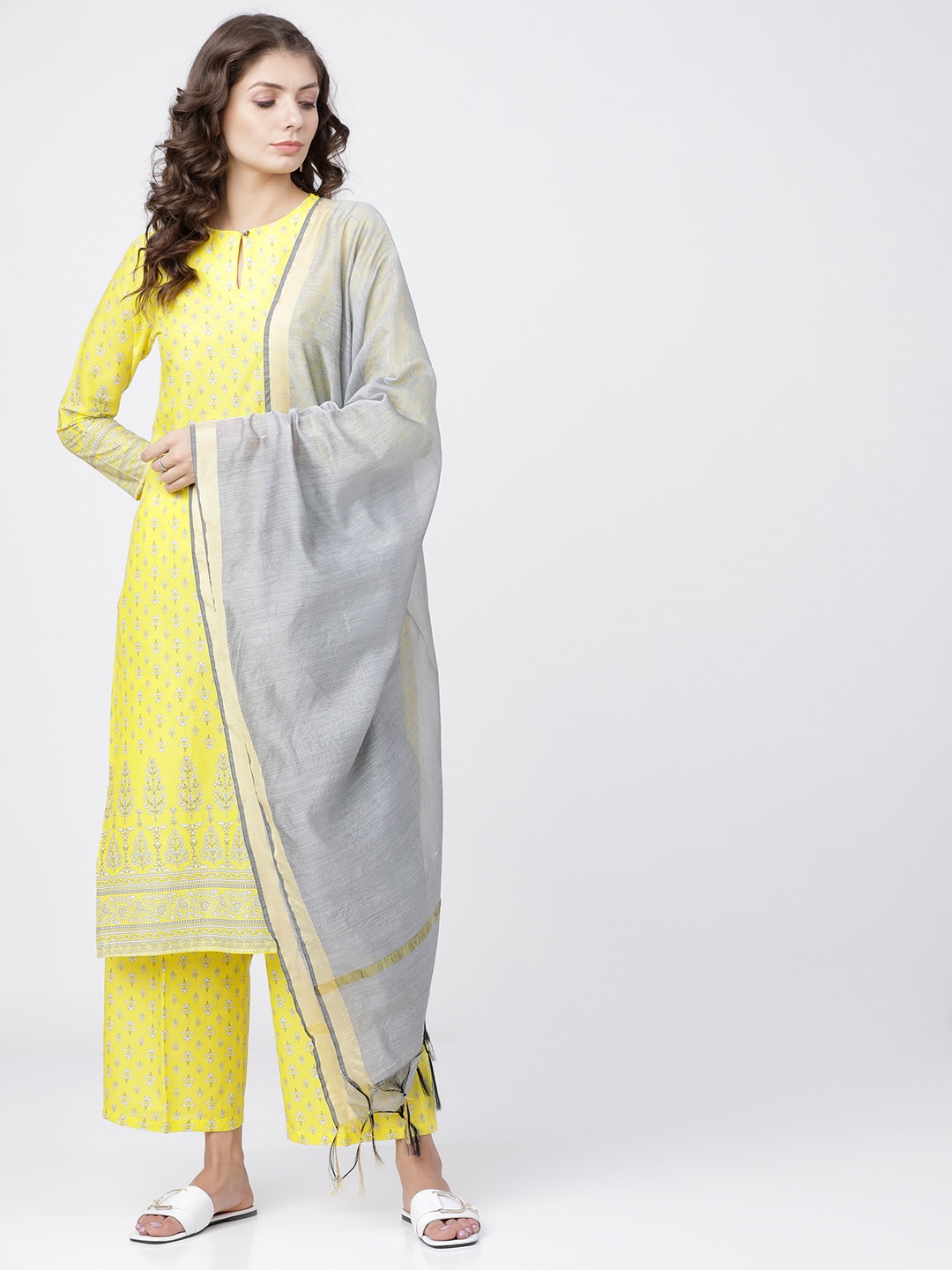 

Vishudh Women Yellow & Silver-Toned Printed Kurta with Palazzos & Dupatta