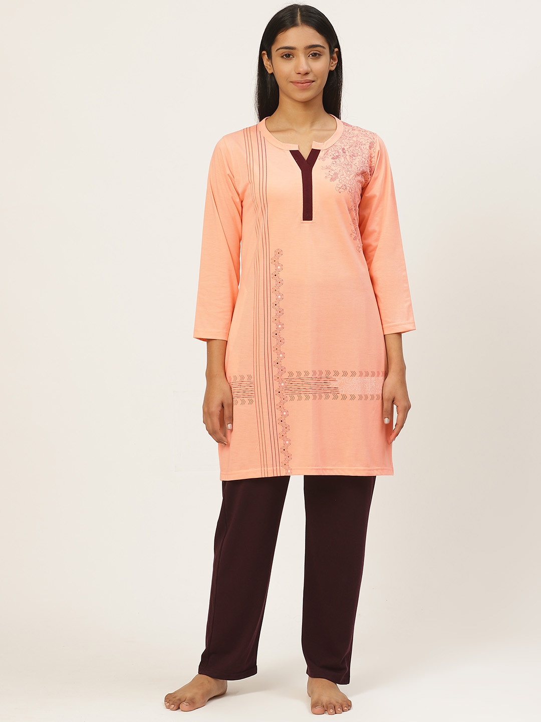 

Duchess Women Peach-Coloured & Burgundy Printed Night Suit