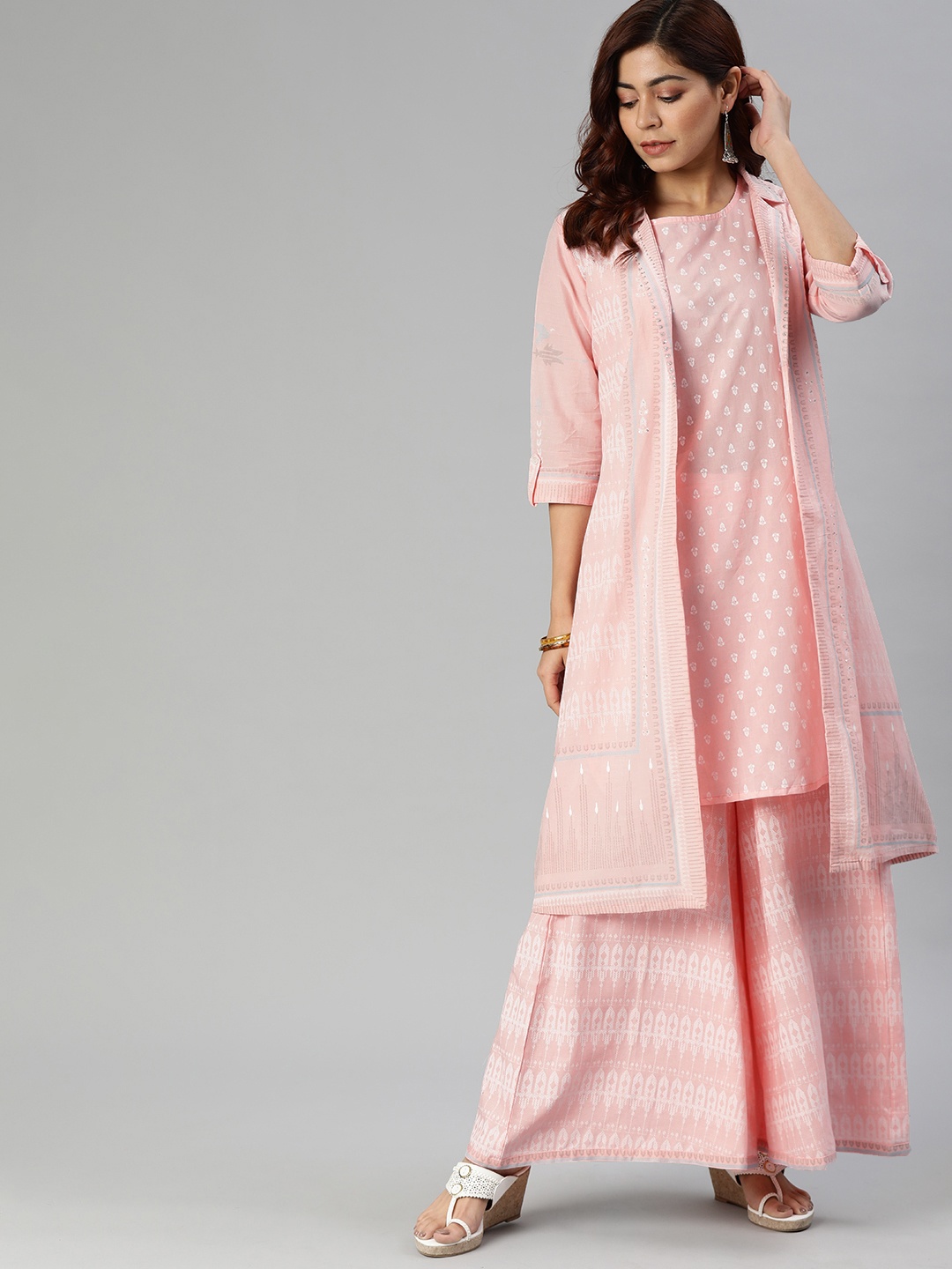 

Divena Women Pink & White Printed Kurta with Palazzos & Jacket