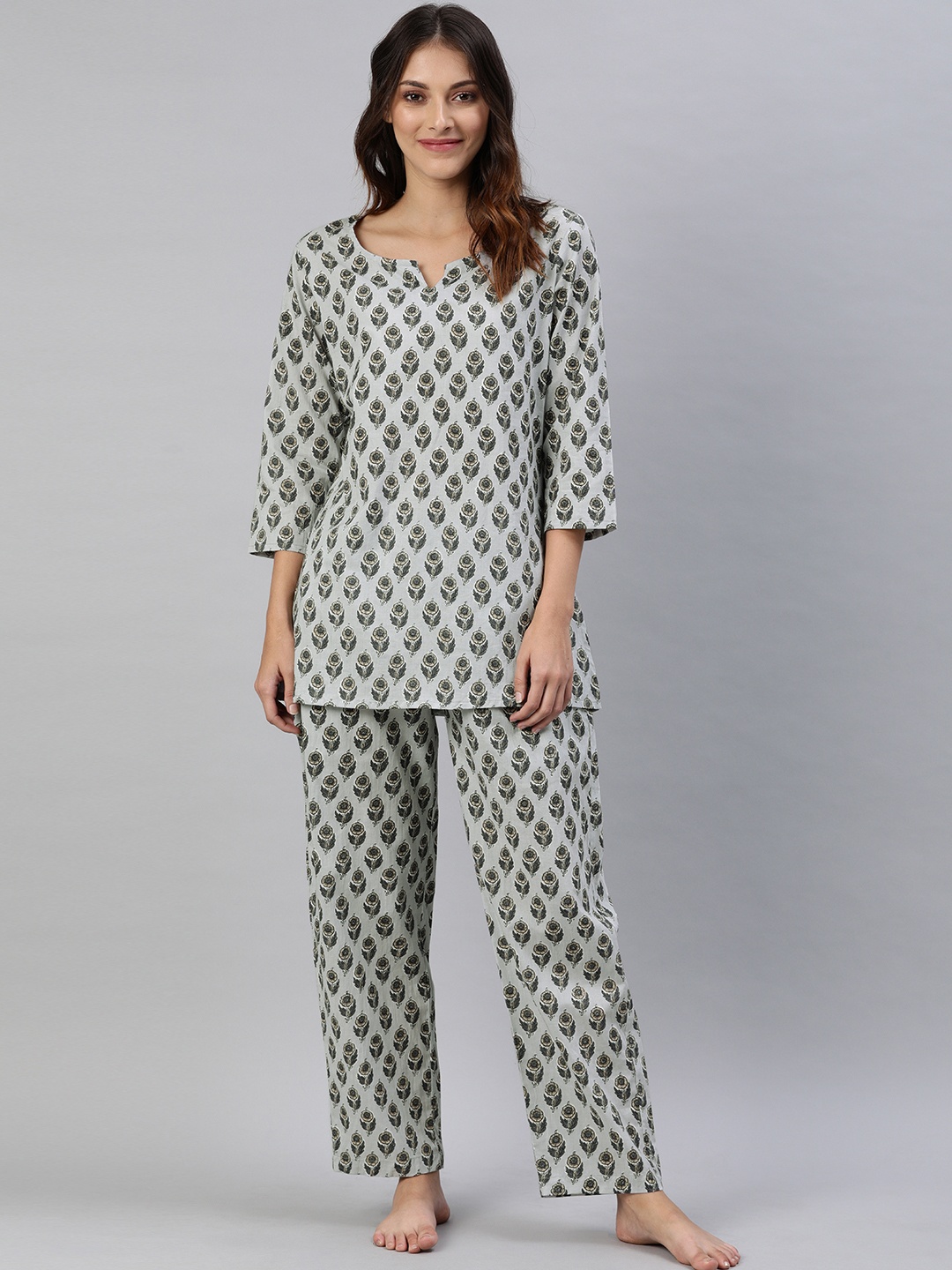 

Divena Women Grey & Beige Floral Printed Night Suit