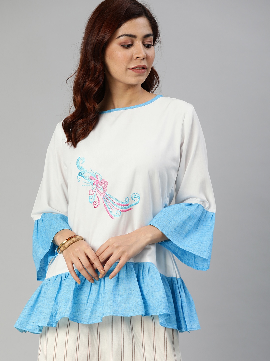 

Shavya Women White Embroidered Tunic