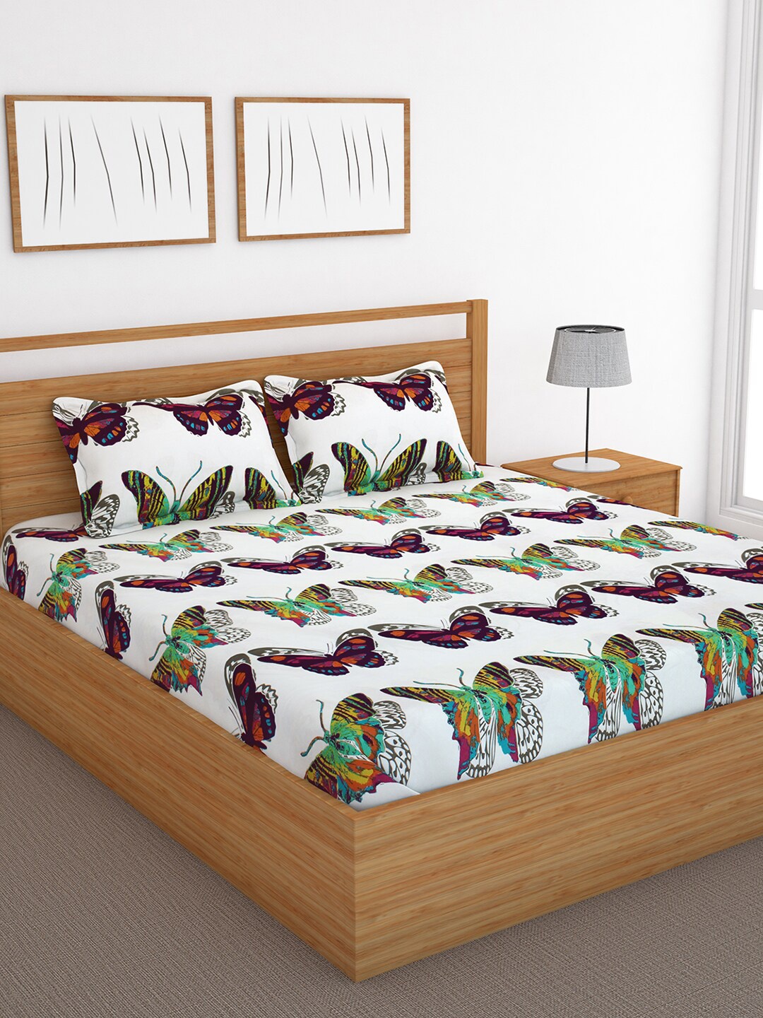 

Bedspun White Printed 120 TC Cotton 1 Double Bedsheet with 2 Pillow Covers