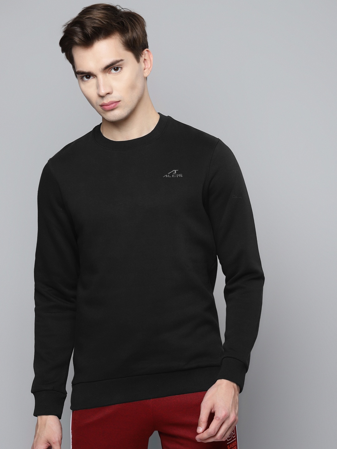 

Alcis Men Black Solid Sweatshirt