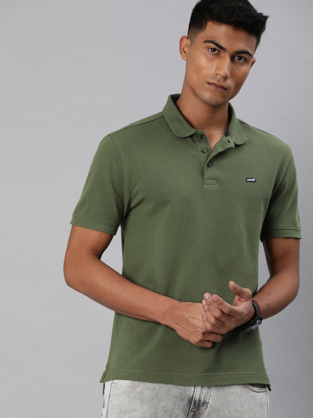 

Levis Men Olive Green Solid Polo Collar Pure Cotton T-shirt