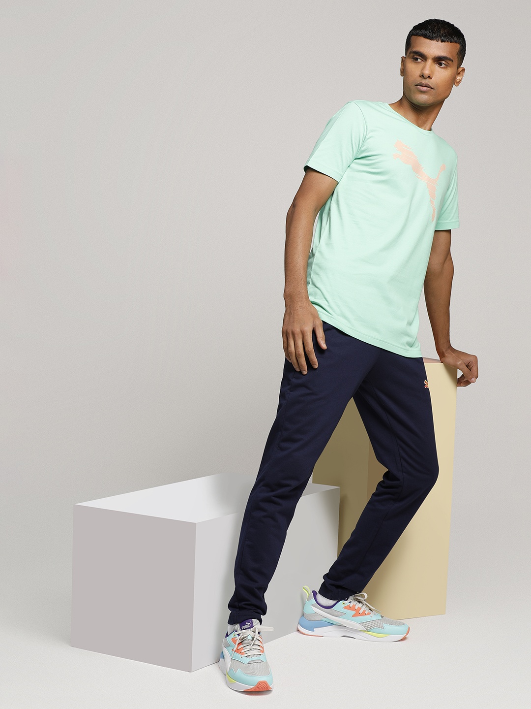 

Puma Men Sea Green Printed Shaded Cat Tee