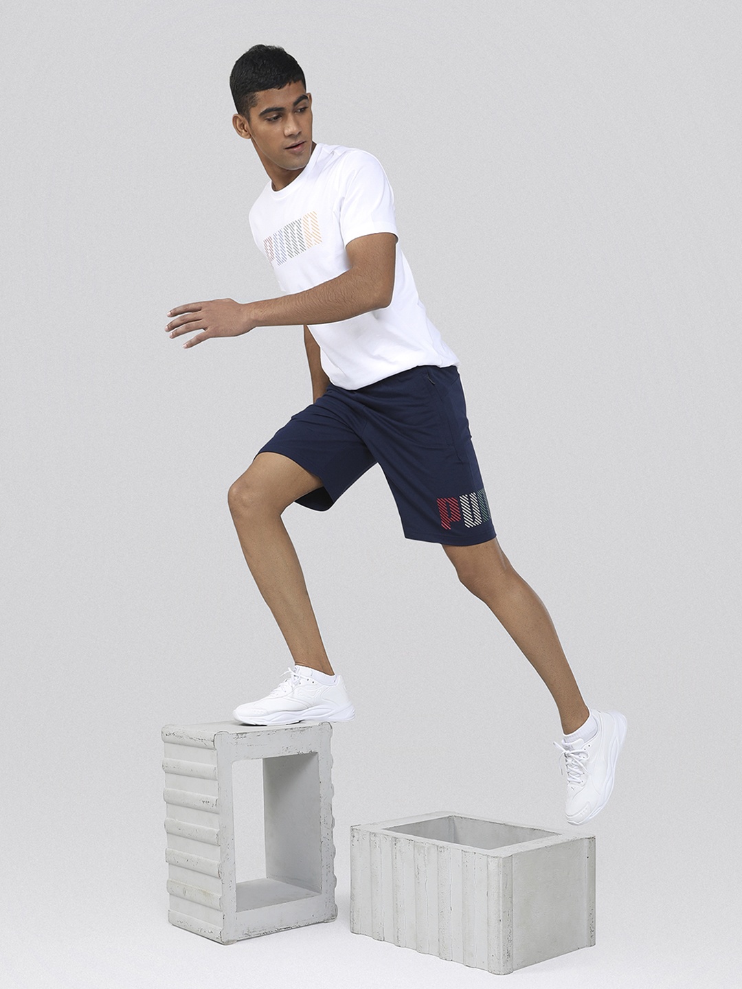 

Puma Men Navy Blue Solid Regular Fit Sports Shorts