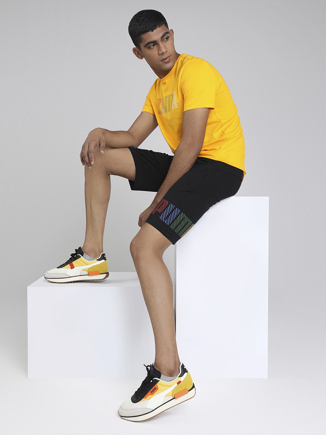

Puma Men Black Solid Regular Fit Regular Shorts