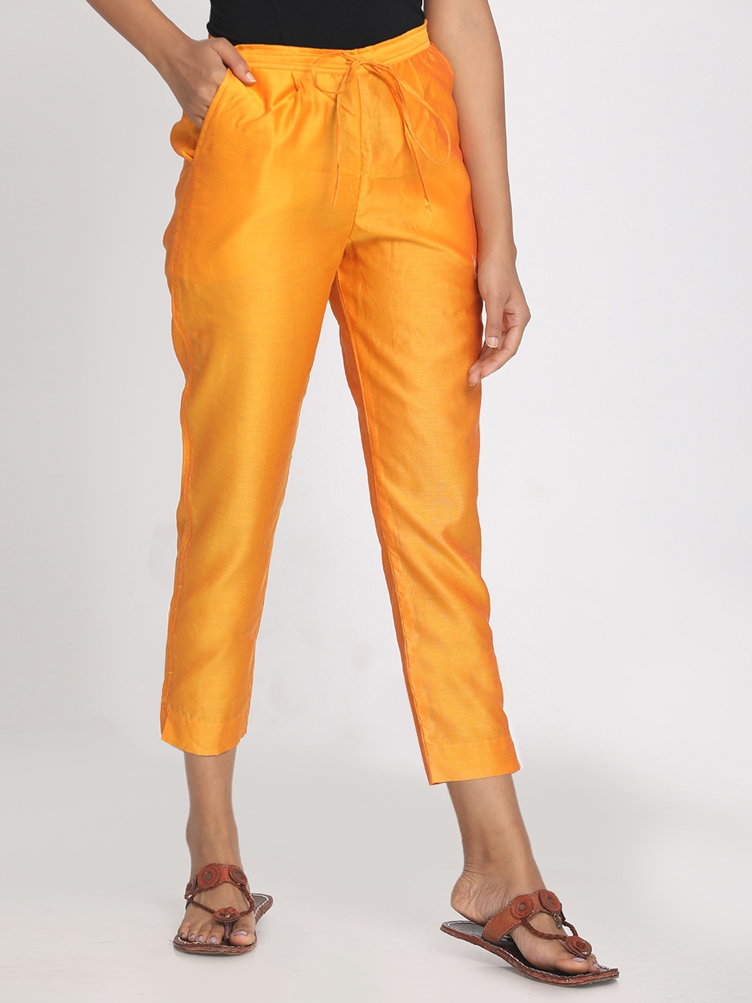 

Nakshi Women Orange Straight Fit Solid Regular Trousers