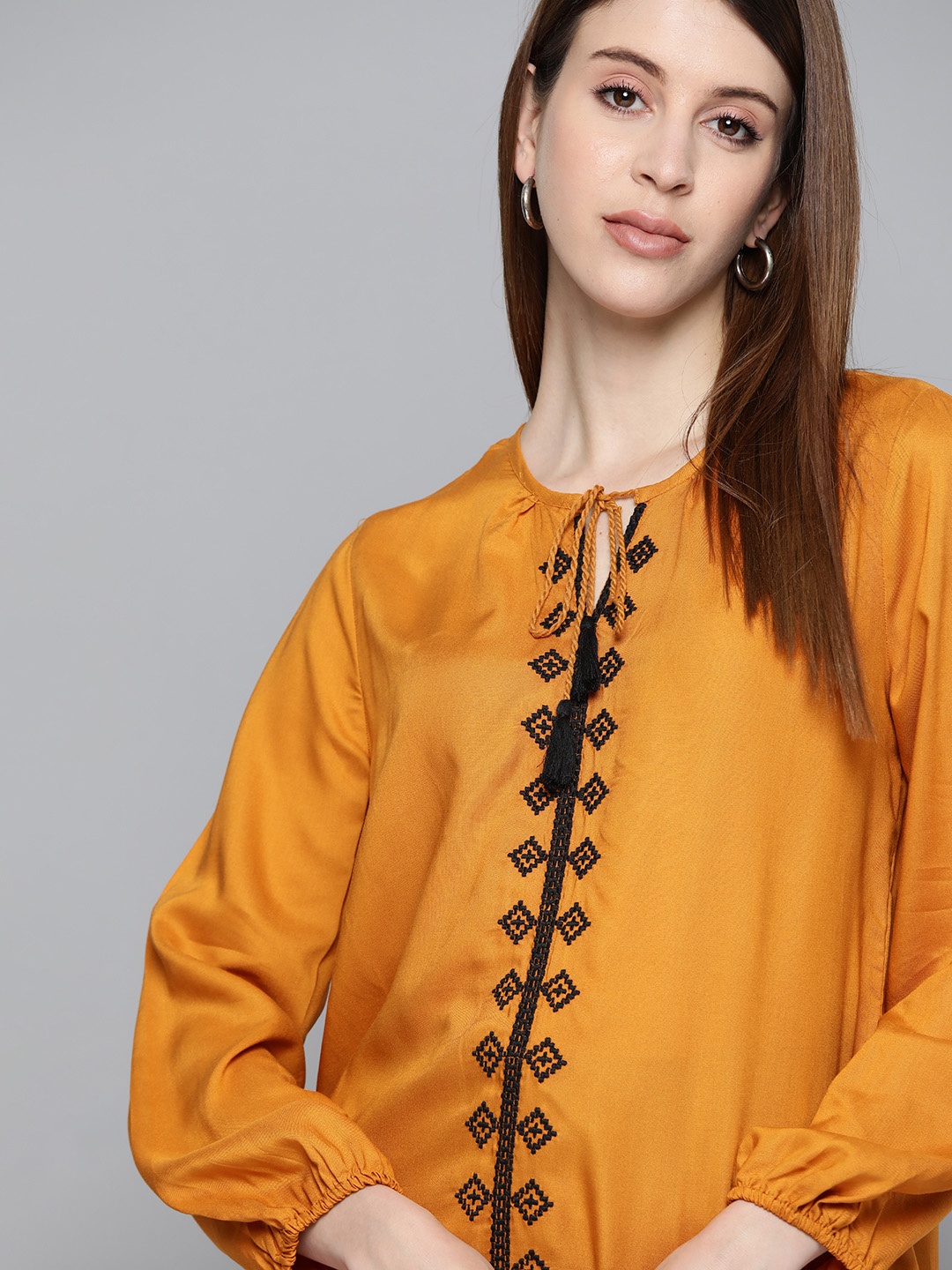 

Chemistry Mustard Yellow Embroidered Detail Tie-up Neck Puff Sleeves Regular Top