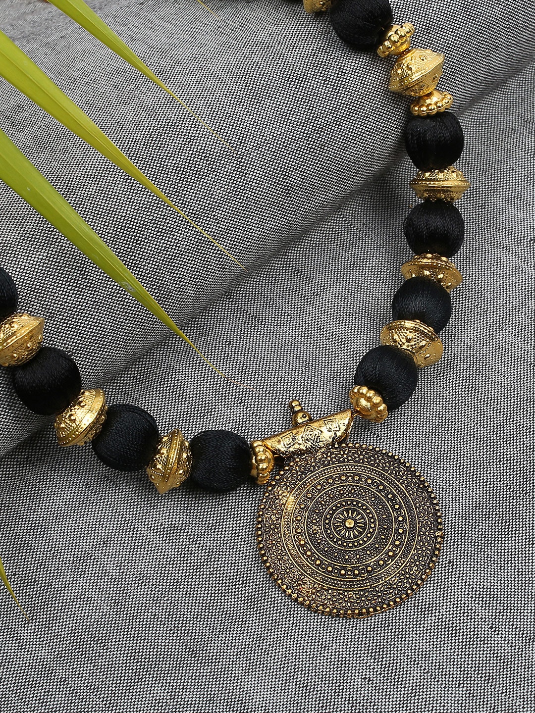 

AKSHARA Black & Gold-Toned Statement Handcrafted Brass Necklace