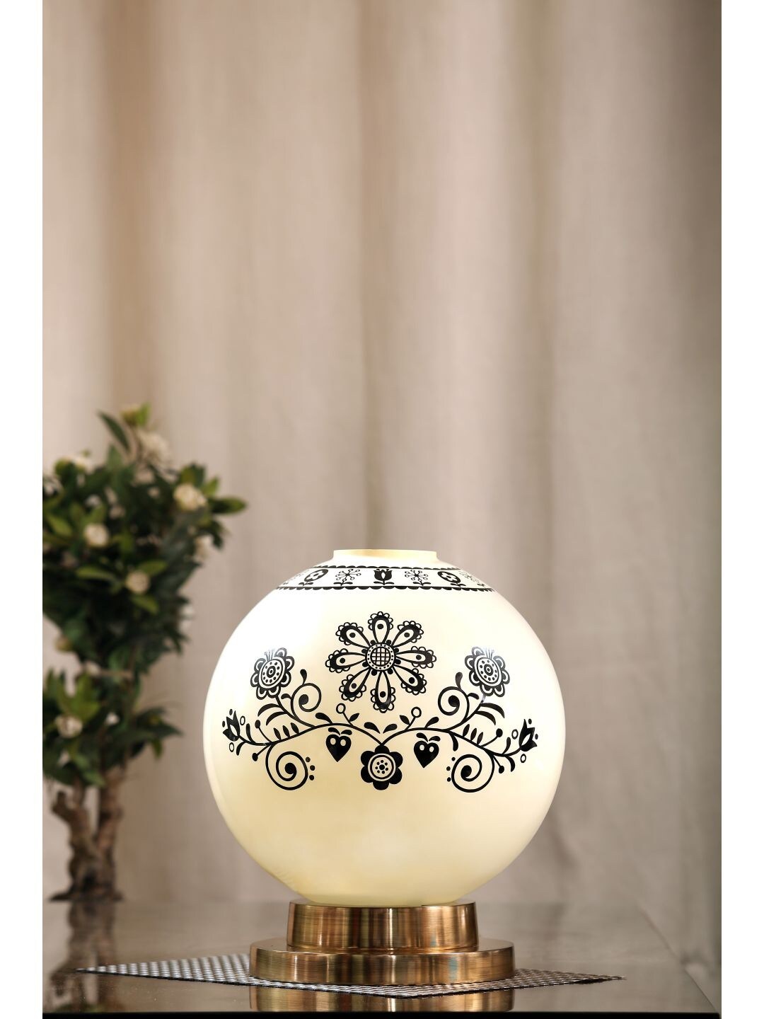 

POSH-N-PLUSH Off White & Black Art Printed Glass Lamp with Brass Antique Finish Metal Base