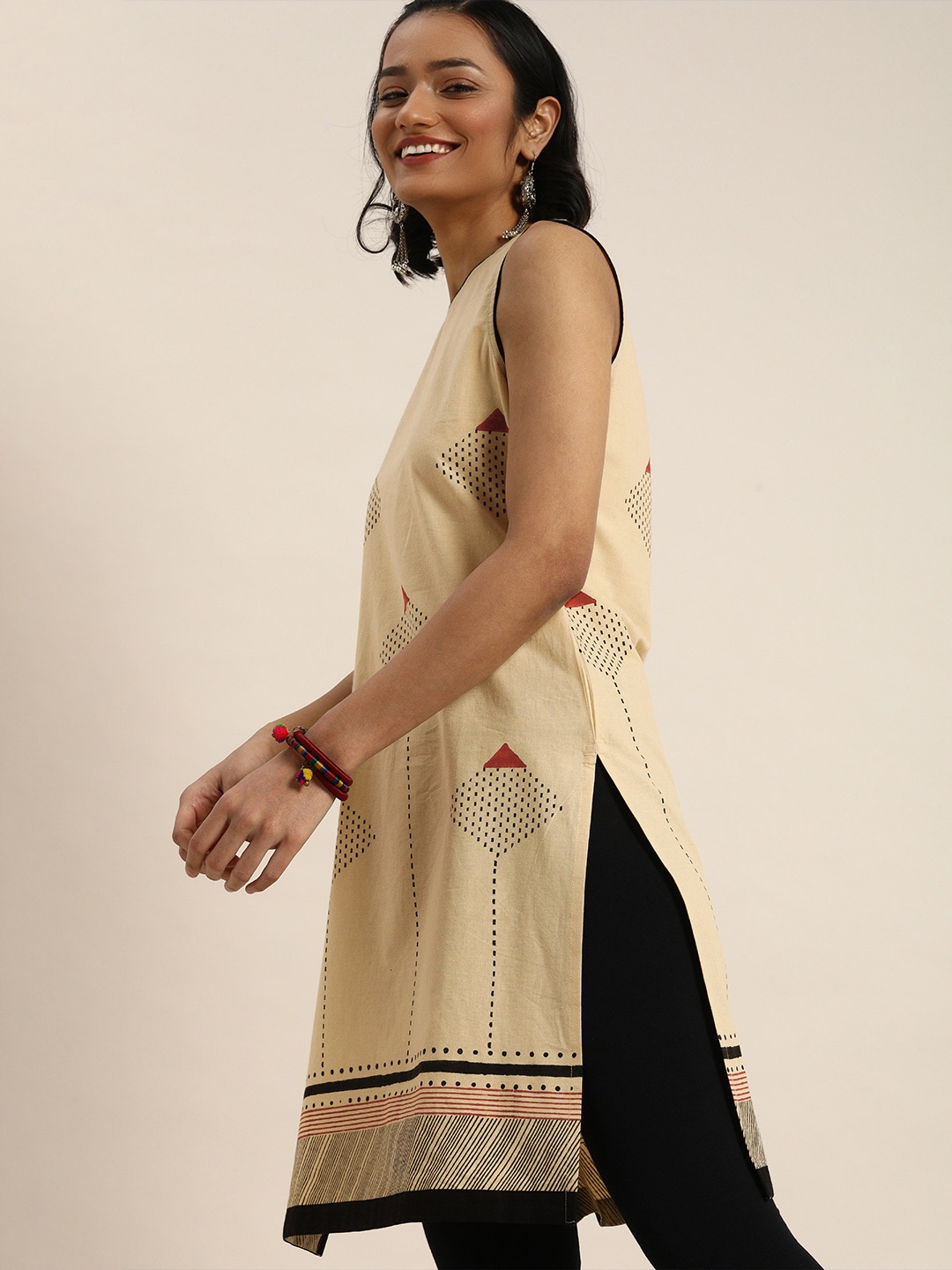 

Taavi Women Rust Red & Beige Bagru Hand Block Print Sustainable Kurta