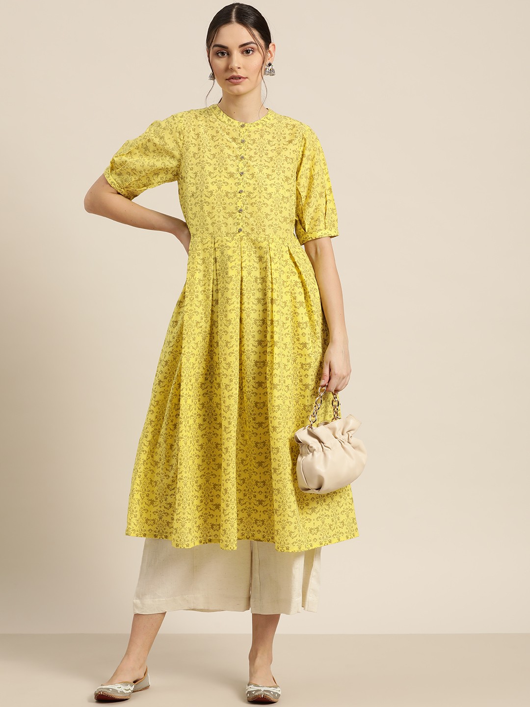 

Moda Rapido Women Yellow & Beige Ethnic Motifs Print Pure Cotton Kurta