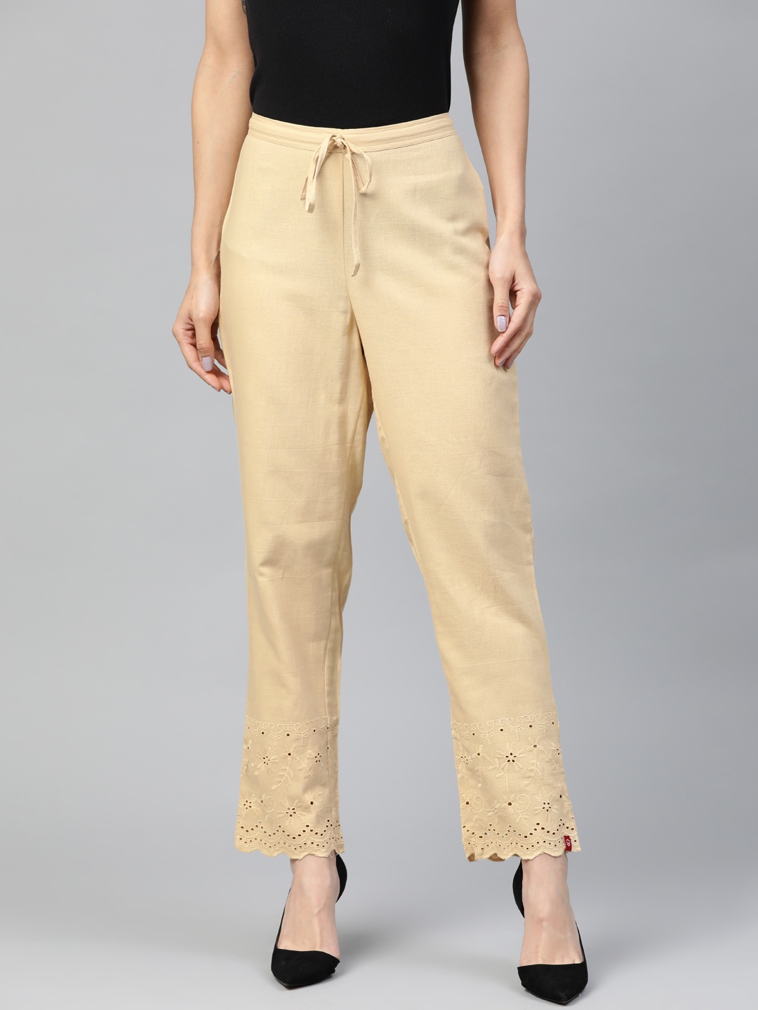 

Biba Women Beige Solid Regular Trousers