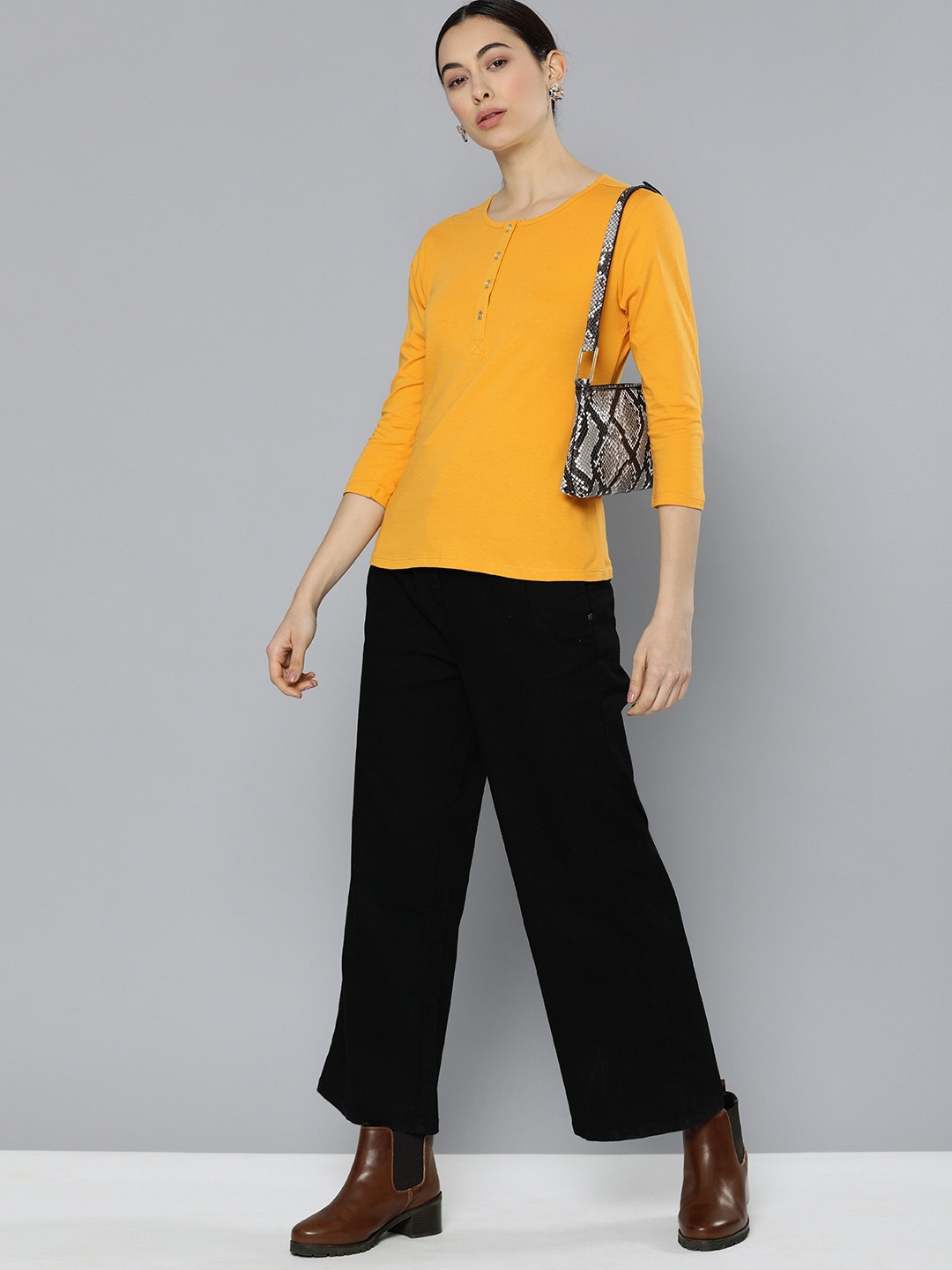 

Chemistry Women Mustard Yellow Solid Henley Neck Pure Cotton T-shirt