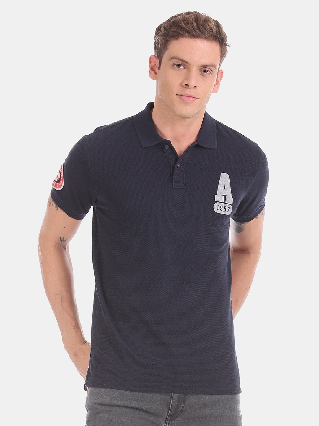 

Aeropostale Men Navy Blue Solid Polo Collar T-shirt