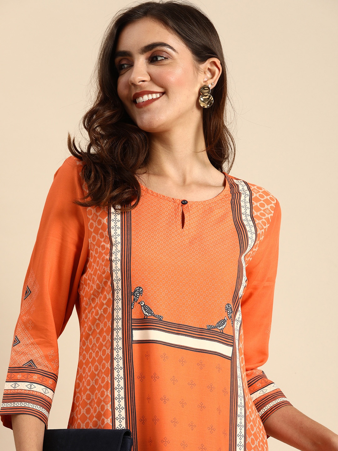 

Anouk Women Orange Printed Kurta with Trousers