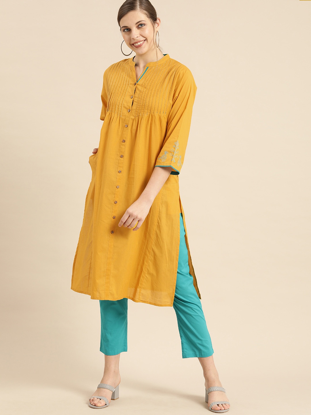 

Anouk Women Mustard Yellow Solid Pintuck V-Neck Pure Cotton Kurta