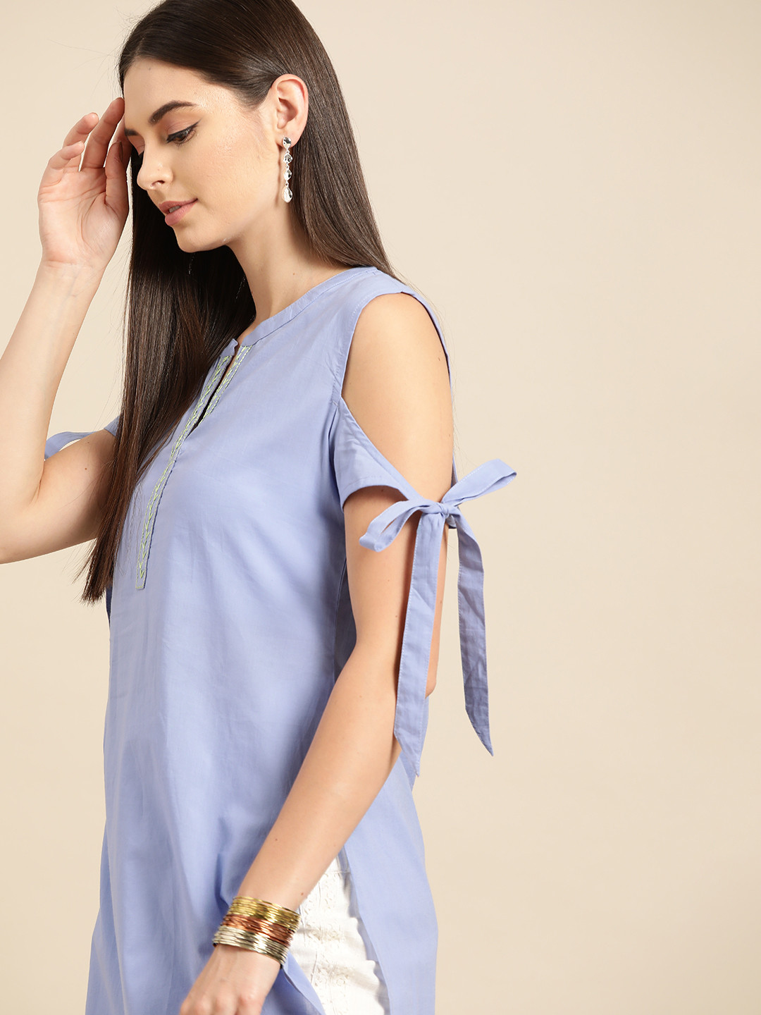 

Anouk Blue Solid Pure Cotton Cold-Shoulder Sleeves Thread Work Kurta with Tie-up detail