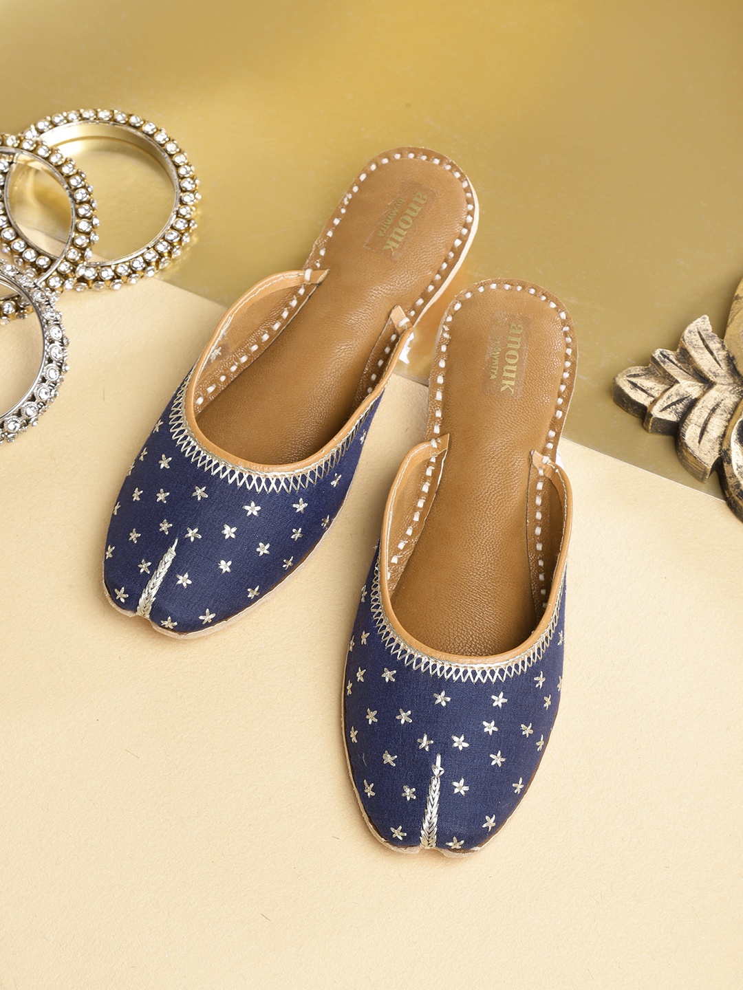 

Anouk Women Navy Blue & Muted Gold-Toned Hand-Made Embroidered Mojaris