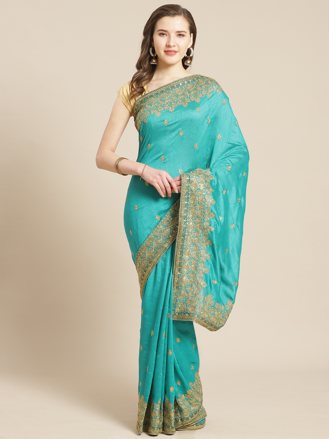 

Kalista Teal Green & Golden Embroidered Saree