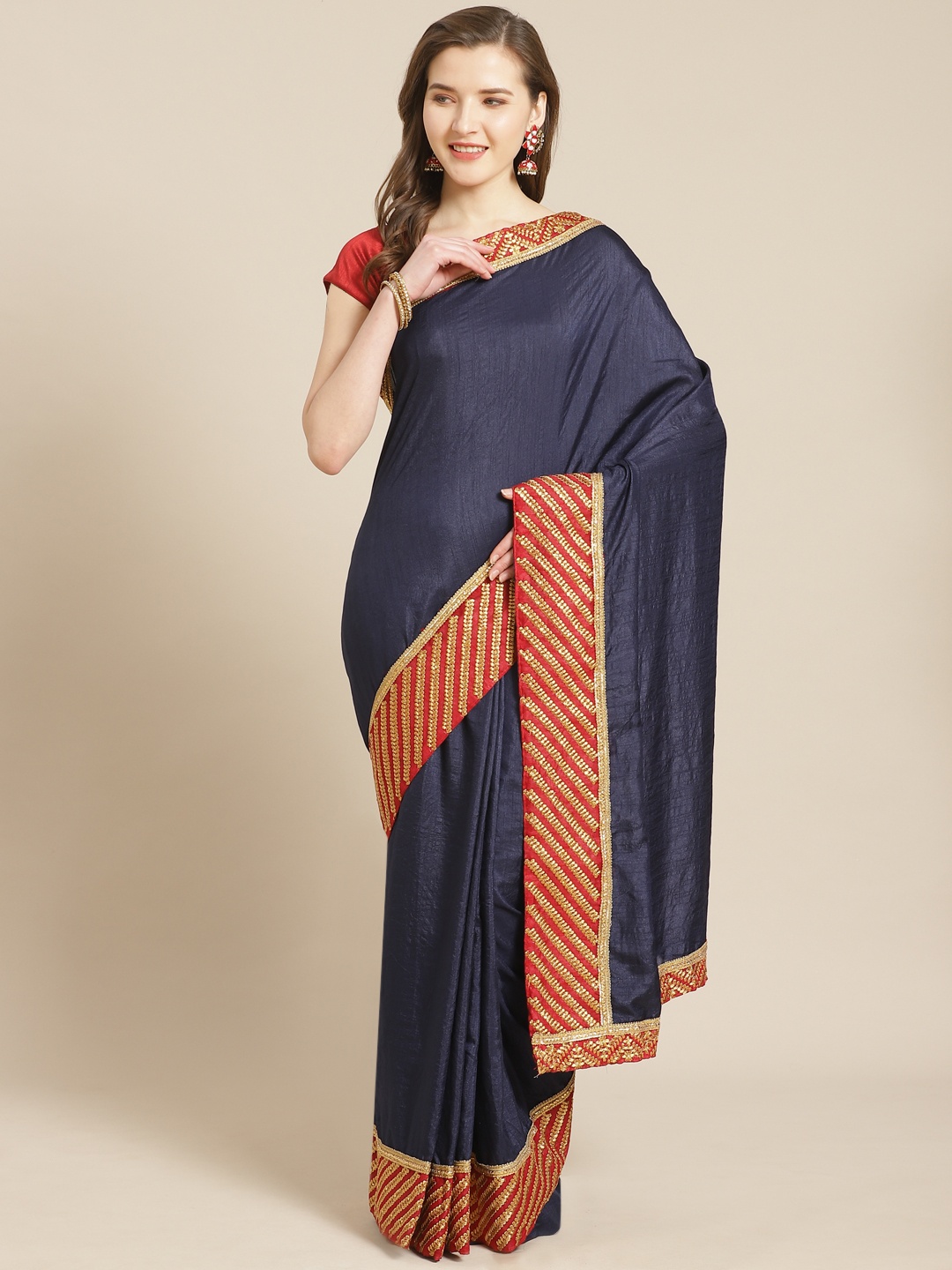

Kalista Navy Blue Solid Saree