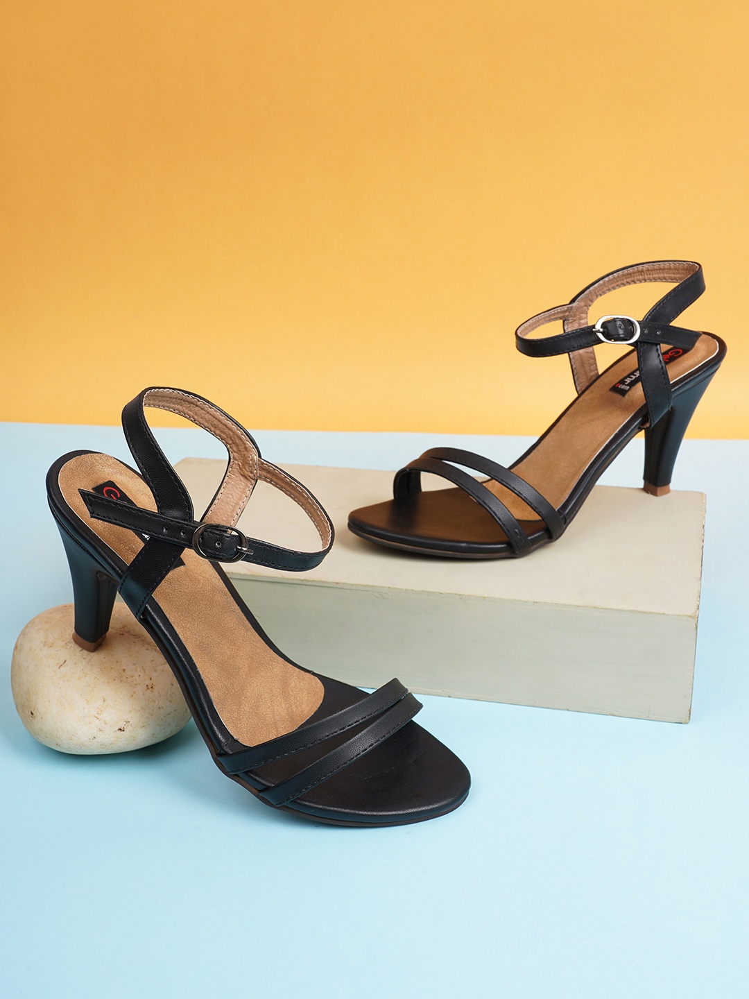 

Get Glamr Women Black Solid Heels
