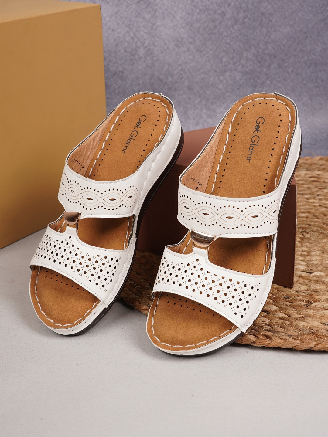 

Get Glamr Women White Solid Platforms