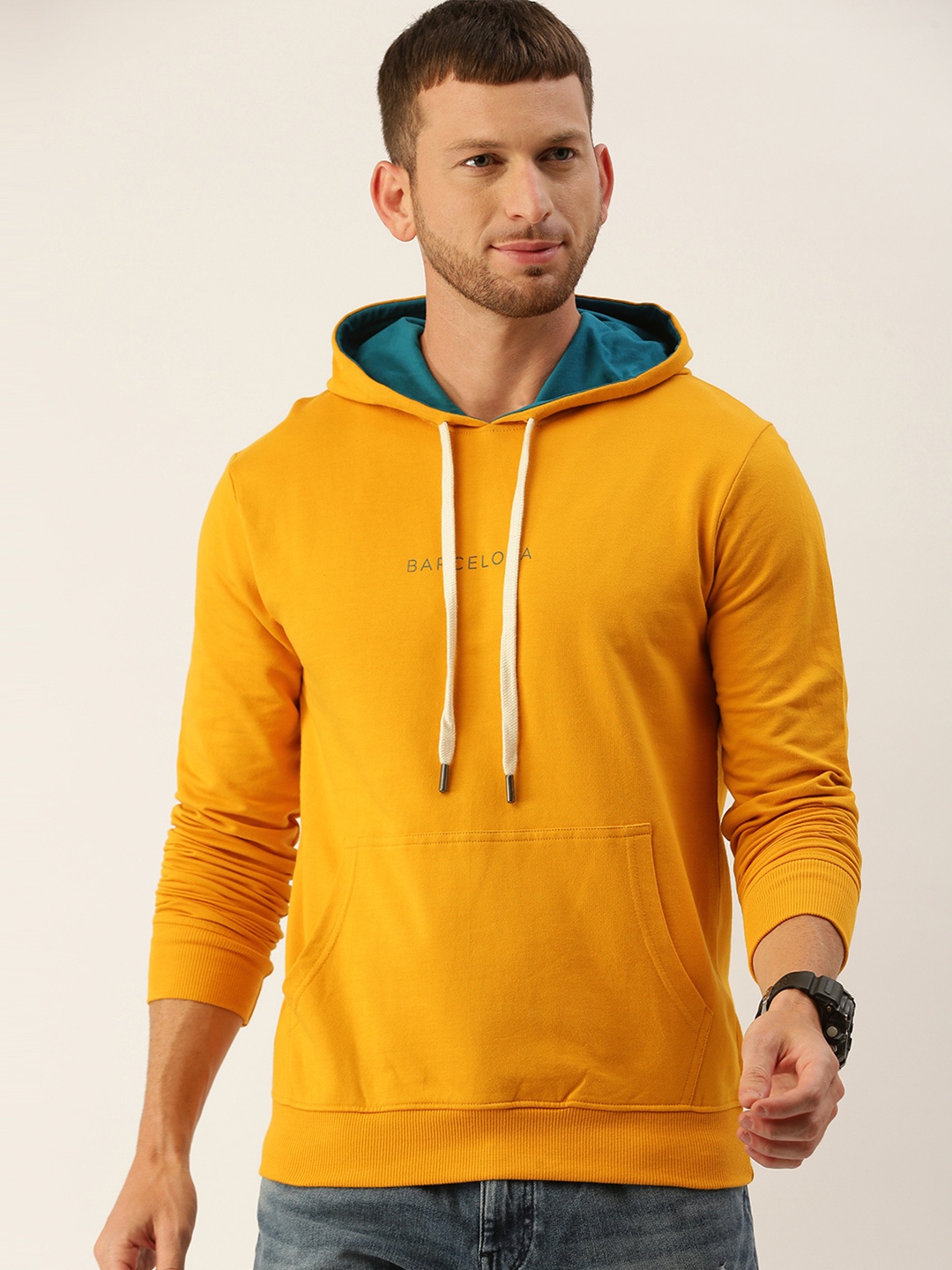 

DILLINGER Men Mustard Yellow Solid Hooded Sweatshirt