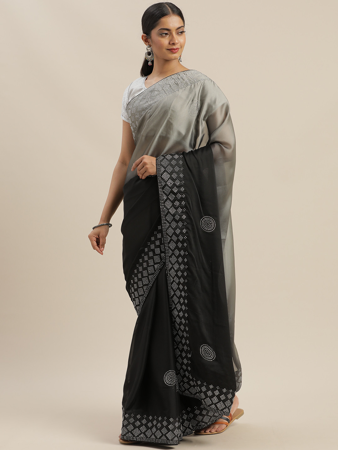 

Mitera Black & Grey Poly Georgette Embellished Saree