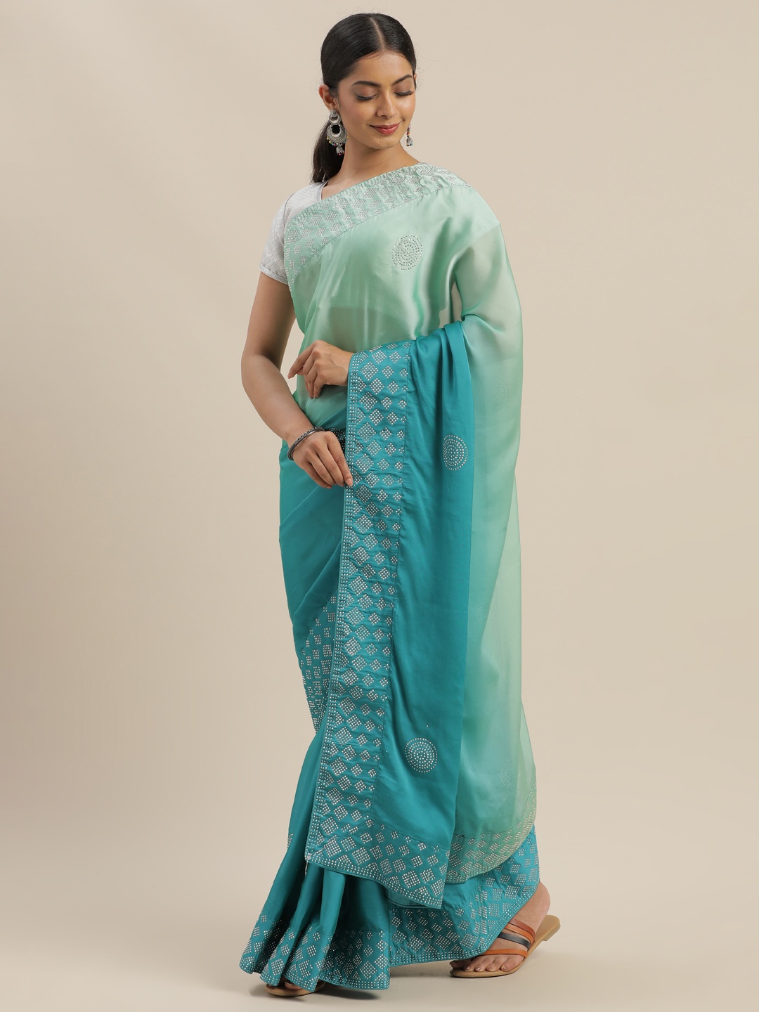 

Mitera Green & Blue Poly Georgette Embellished Saree