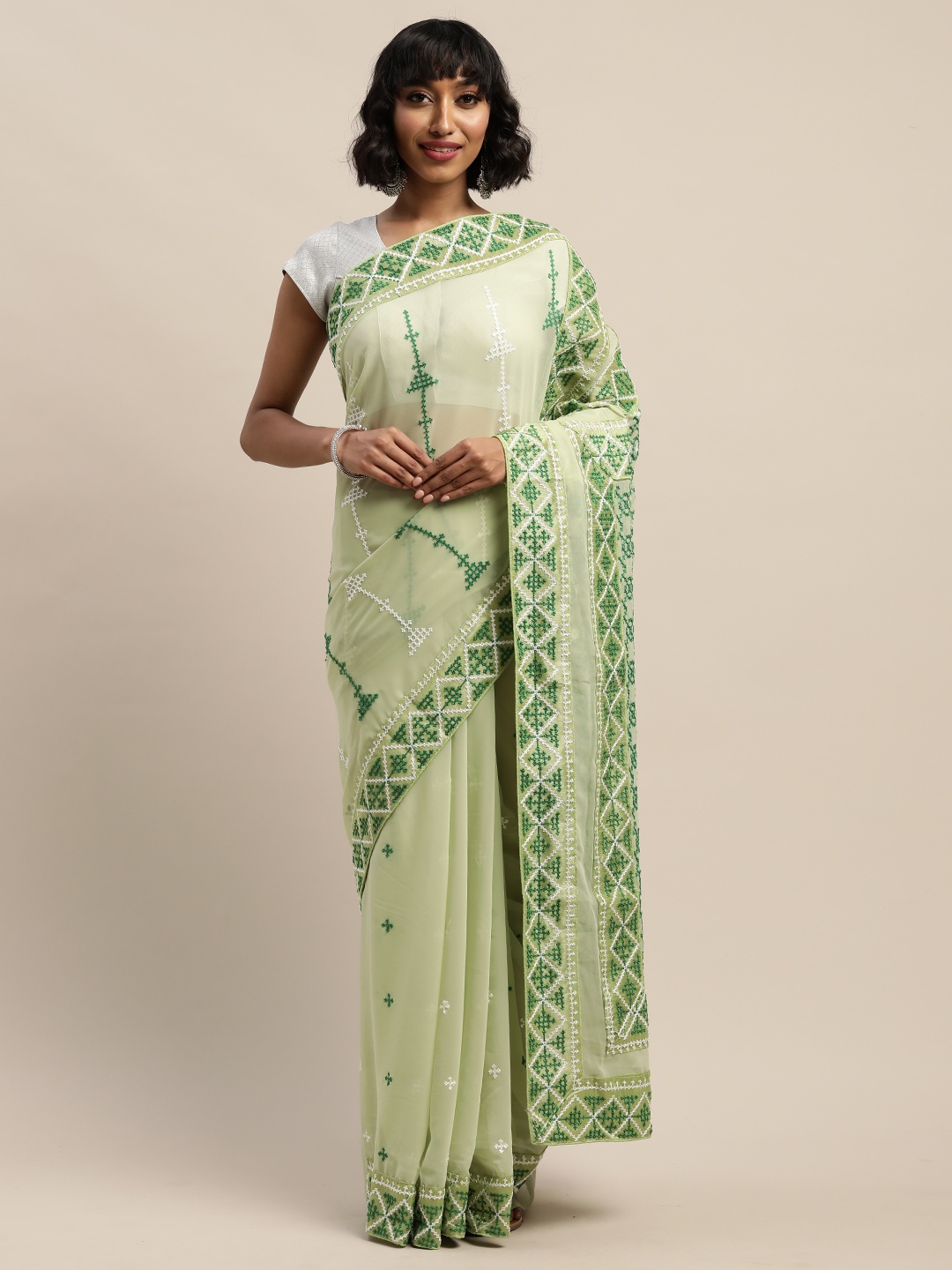 

Mitera Green & White Pure Georgette Embroidered Saree