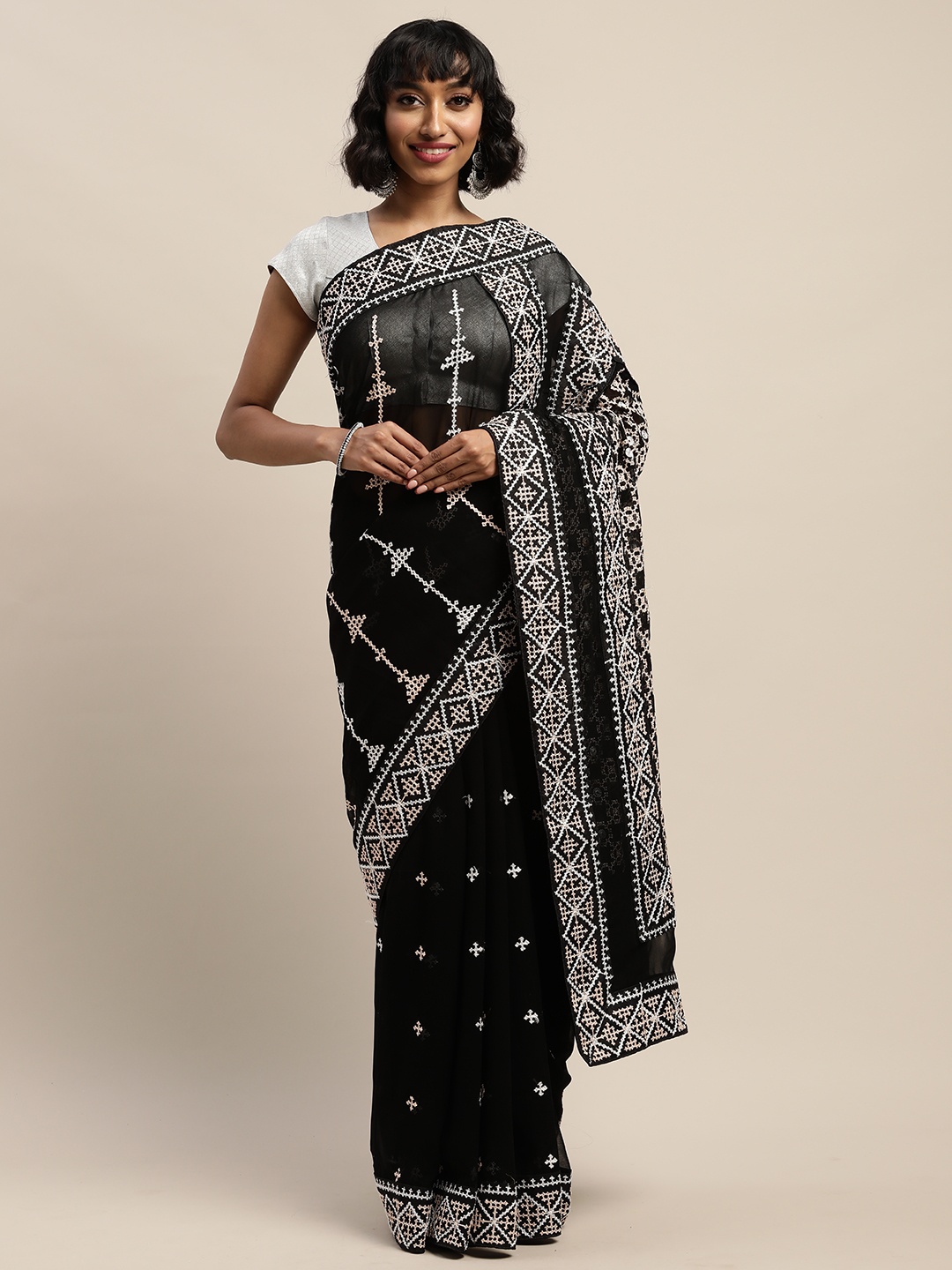 

Mitera Black & White Pure Georgette Embroidered Saree