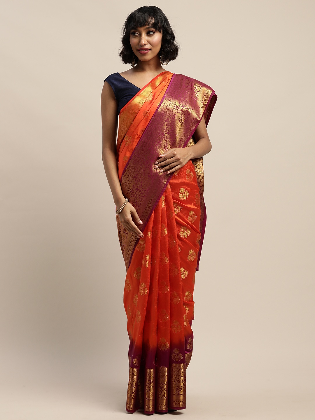 

Mitera Orange & Pink Silk Blend Woven Design Banarasi Saree