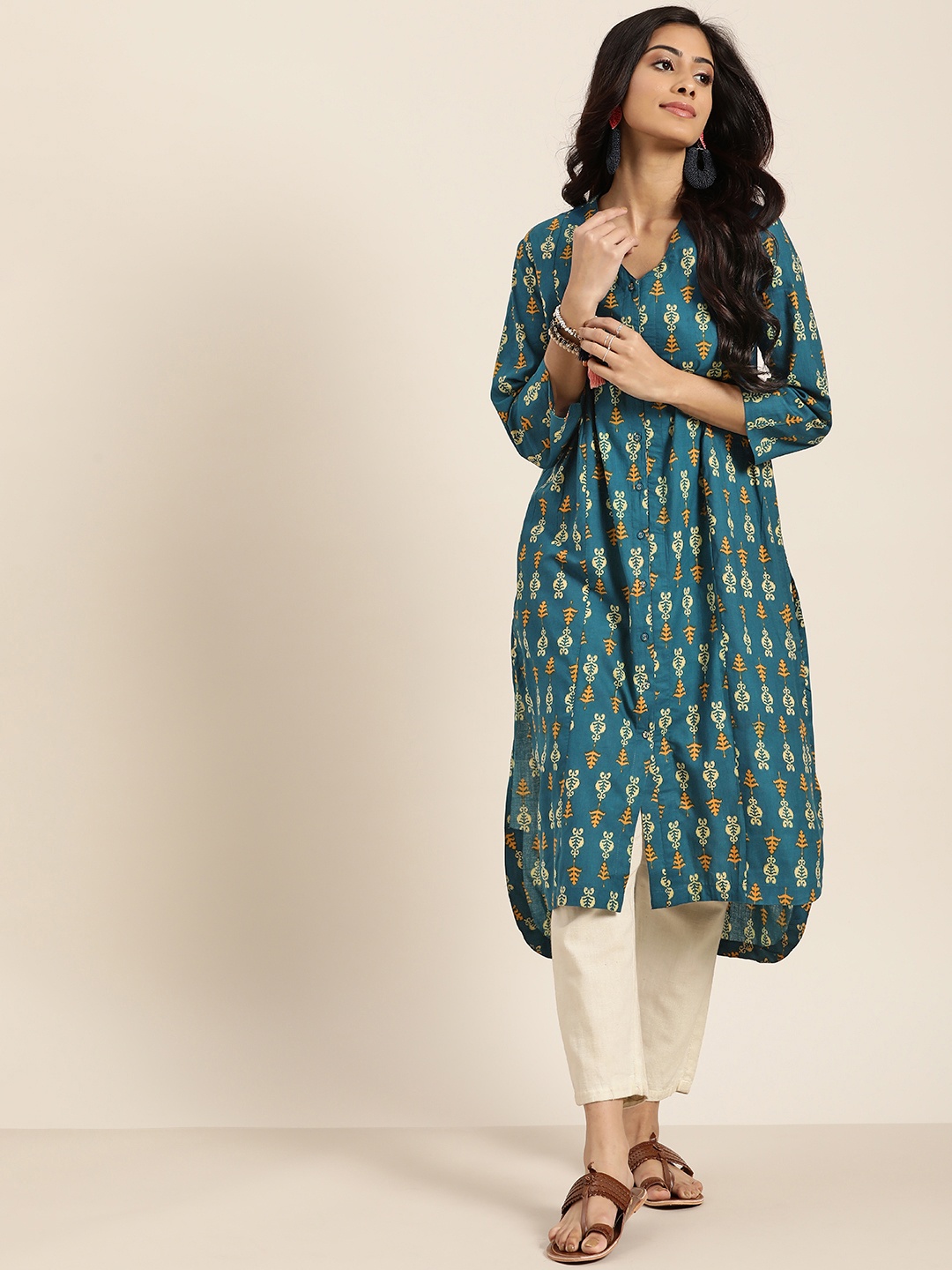 

Sangria Women Teal Blue & Mustard Yellow Ikat Printed Cotton Straight Kurta