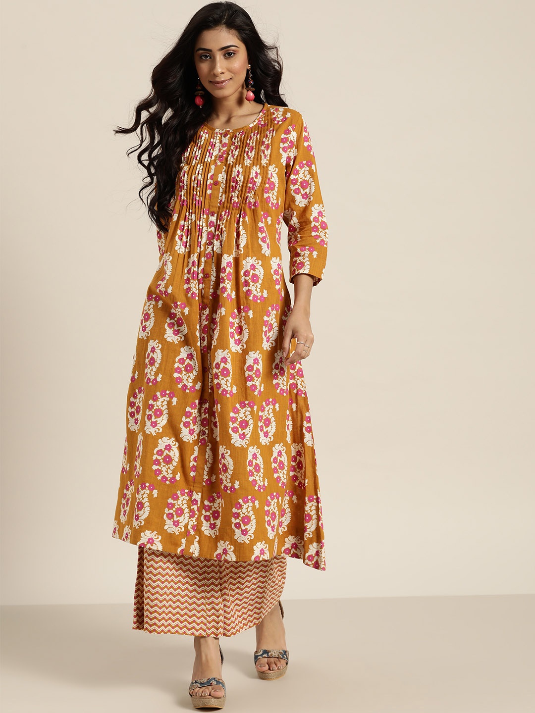 

Sangria Women Brown & Off-White Printed Kurta with Palazzos