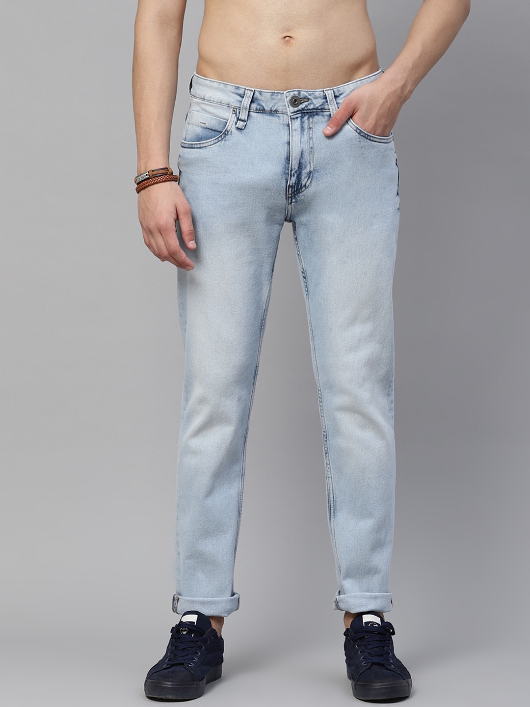 

The Roadster Lifestyle Co Men Blue Tapered Fit Light Fade Stretchable Jeans