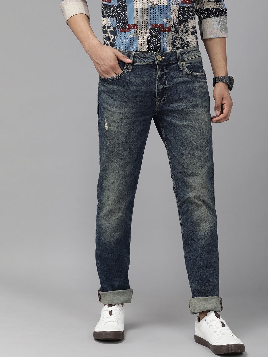 

Jack & Jones Men Blue CLARK Regular Fit Mid-Rise Low Distress Stretchable Jeans