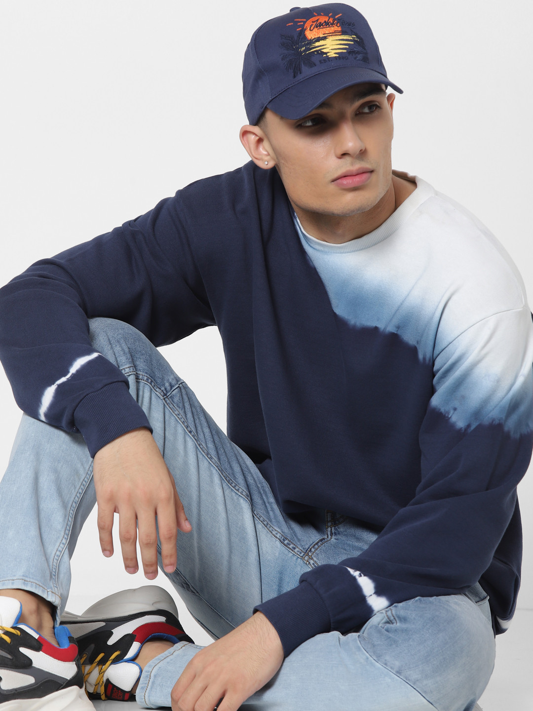

Jack & Jones Men White & Blue Solid Sweatshirt