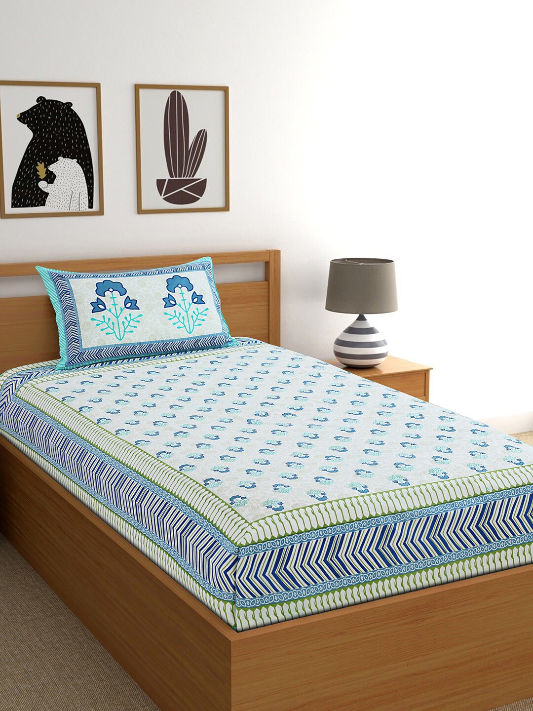 

Salona Bichona White & Blue Floral 120 TC Cotton 1 Single Bedsheet With 1 Pillow Cover