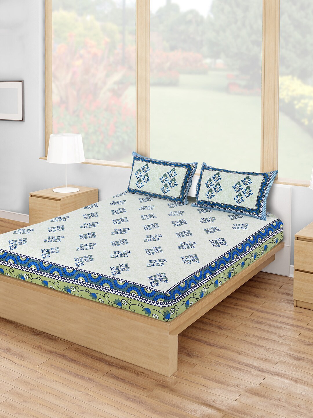 

Salona Bichona White & Blue Floral Printed 120 TC Cotton Double Queen Bedsheet With 2 Pillow Covers