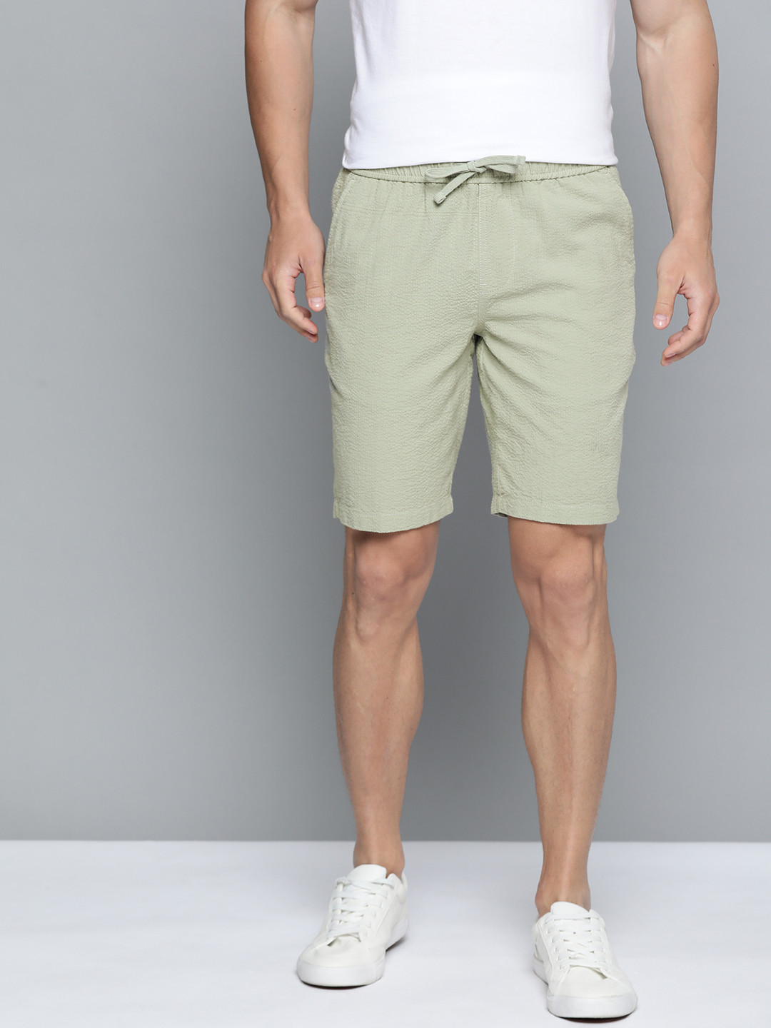 

Mast & Harbour Men Green Pure Cotton Self Design Regular Fit Shorts
