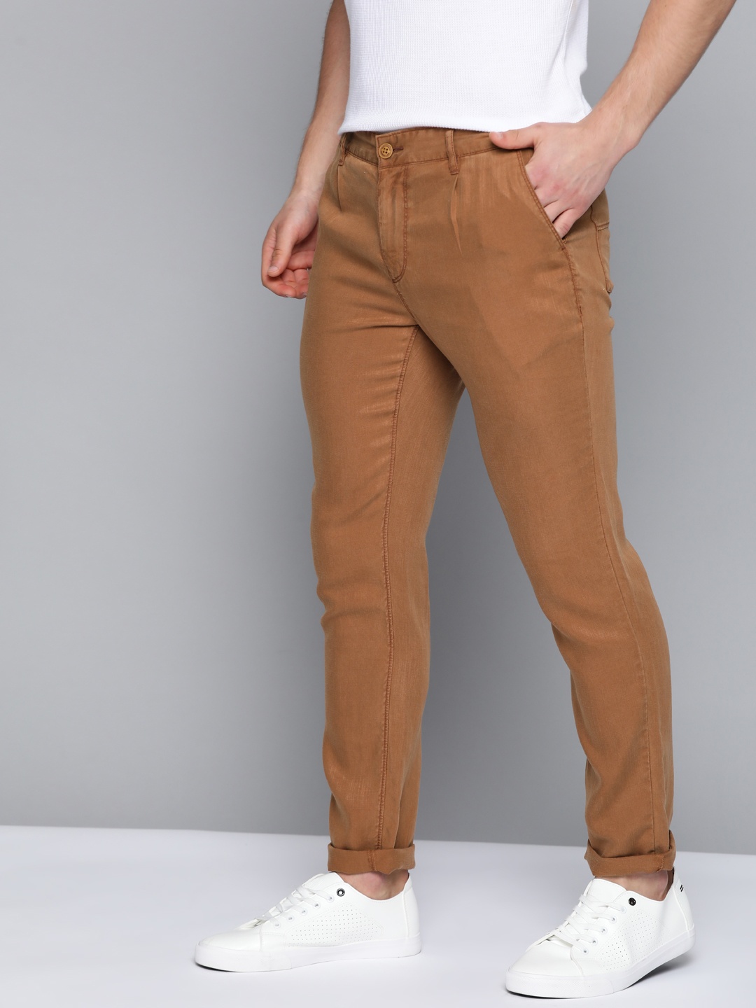 

Mast & Harbour Men Brown Regular Fit Solid Trousers