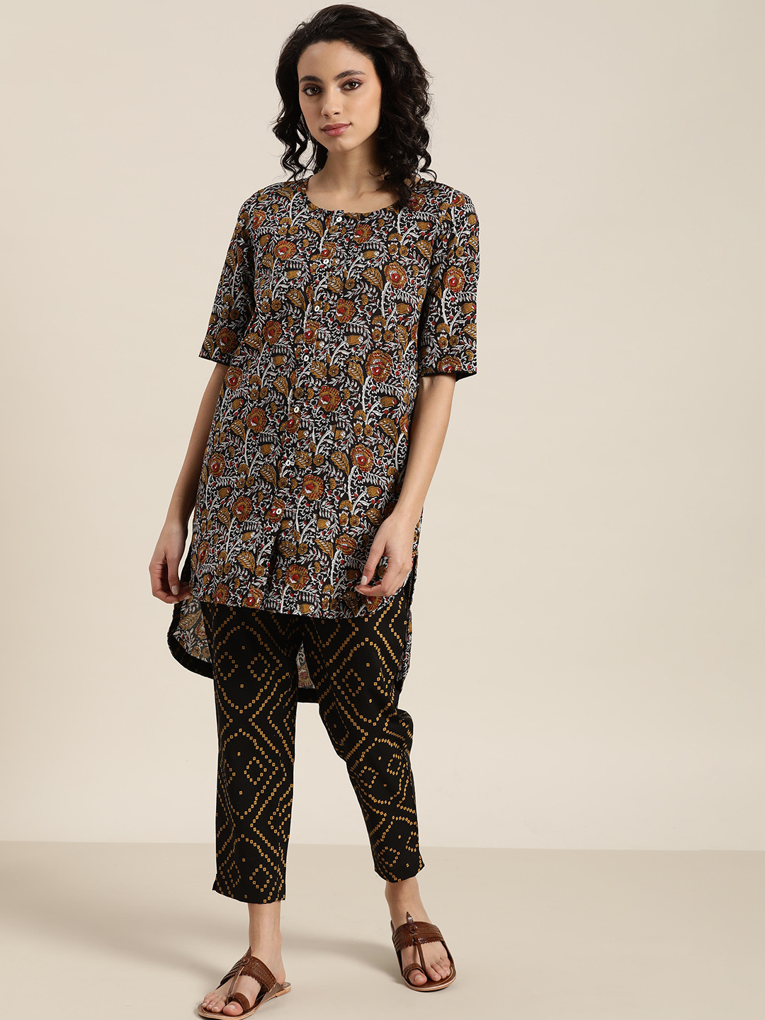 

Sangria Women Black & Mustard Brown Pure Cotton Floral Print High-Low Kurta with Trousers